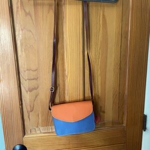 Leather crossbody with dust bag.